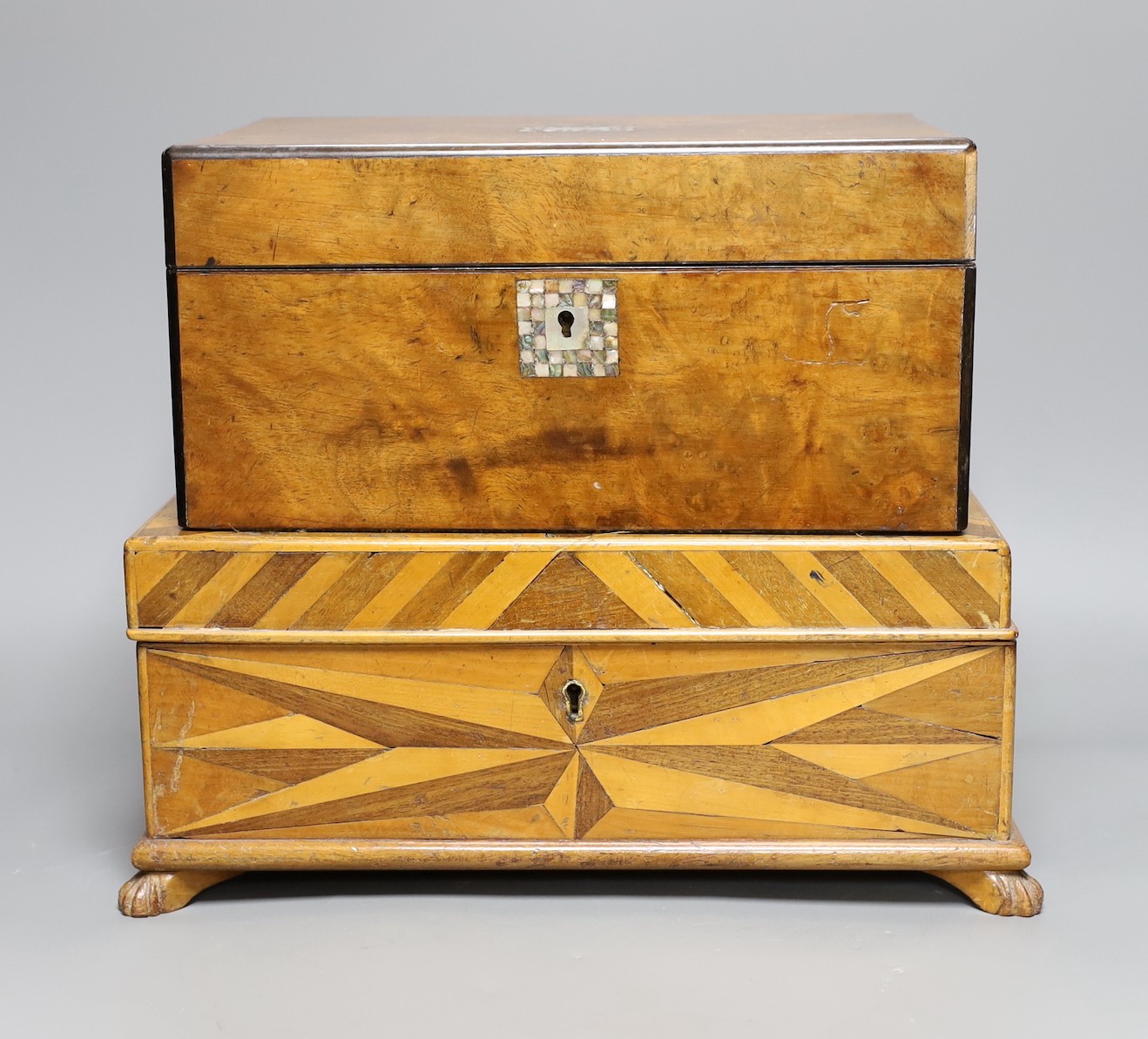 A parquetry inlaid box and a walnut mother of pearl inlaid sewing box, parquetry box 35 cms x 14 cms